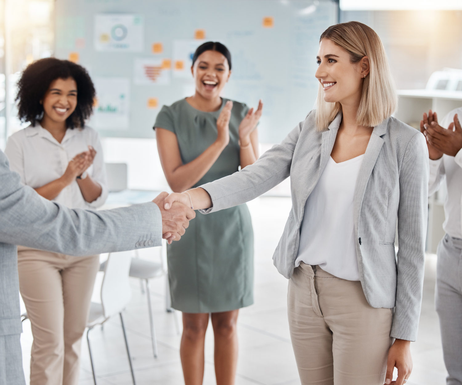Handshake, partnership and congratulations after hiring new employee or leadership promotion with a.